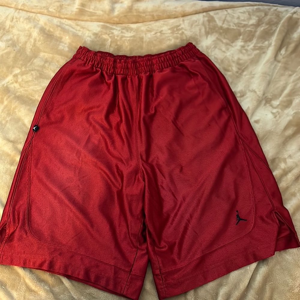 Air Jordan red basketball shorts size XL.